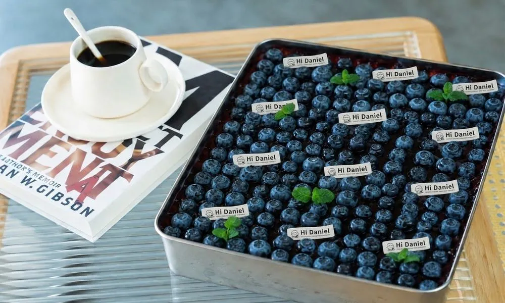 Blueberry dessert A tray of fresh blueberries garnished with mint leaves at Hi Daniel, a Dessert Shop restaurant in Tukwila