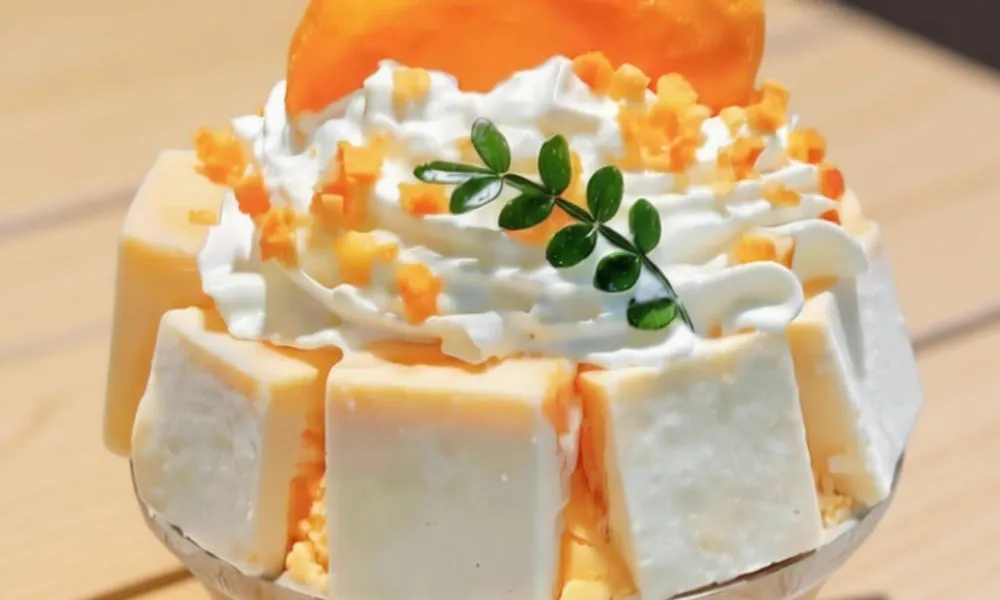 Mango Sago Sweet dessert with mango, sago, whipped cream at Hi Daniel, a Dessert Shop restaurant in Tukwila